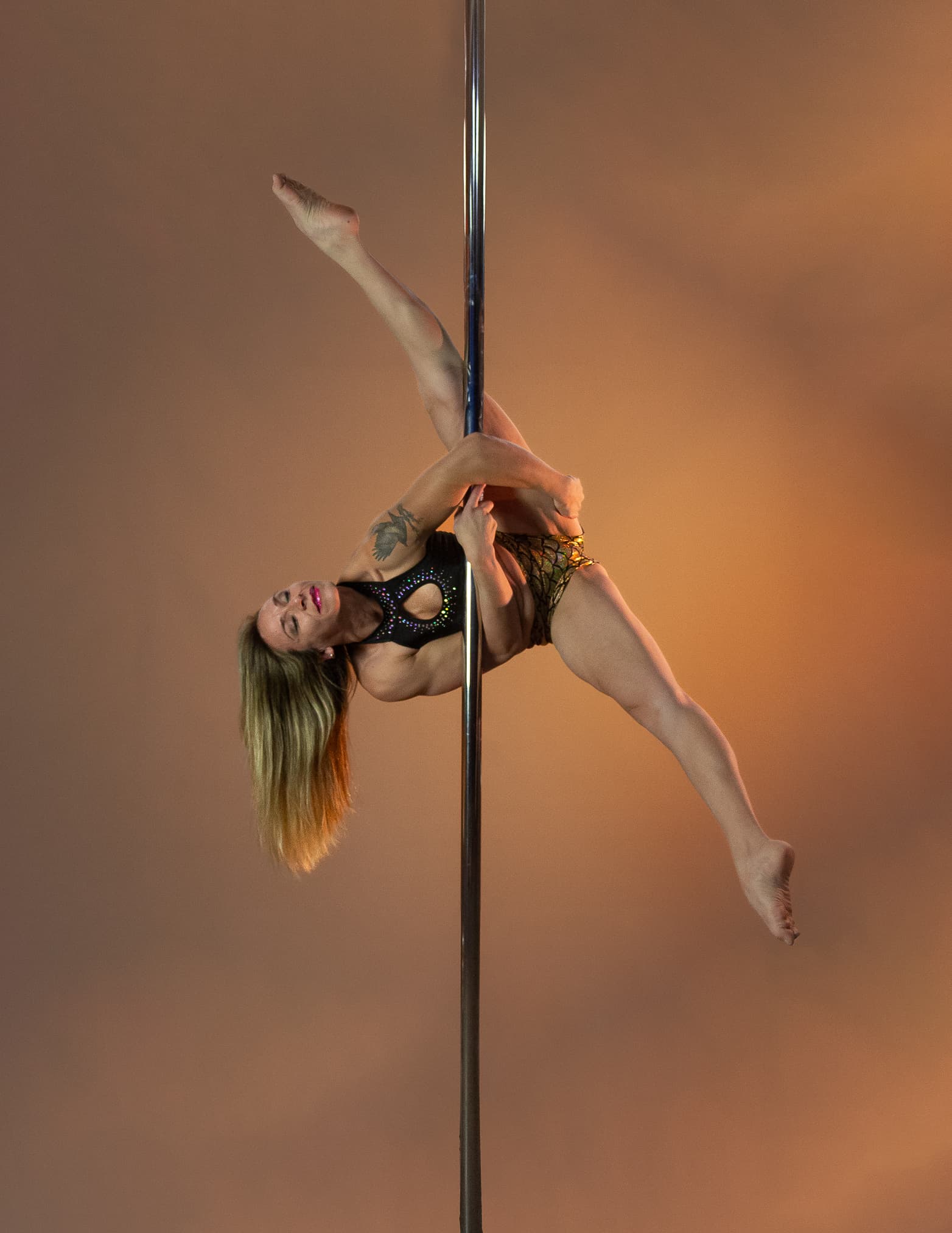 Sesión de pole dance