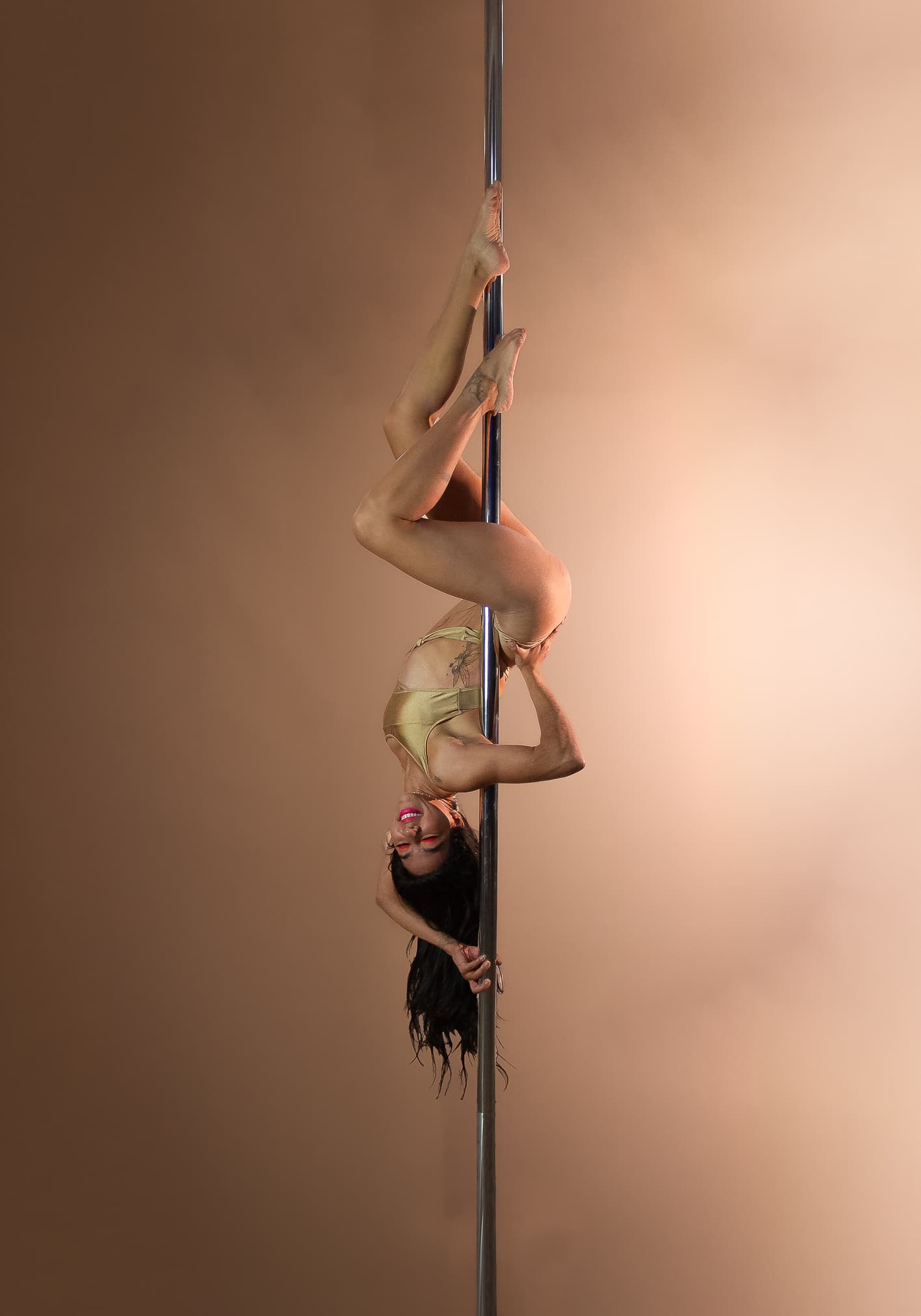 Sesión de pole dance